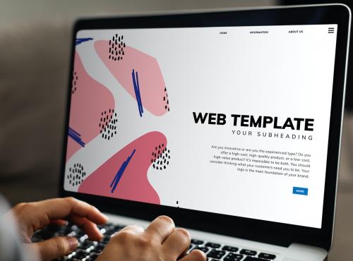 Working on a web template on the laptop - 502728