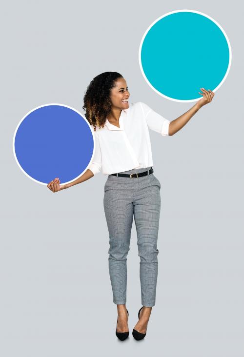 Young businesswoman holding blank circles - 492760