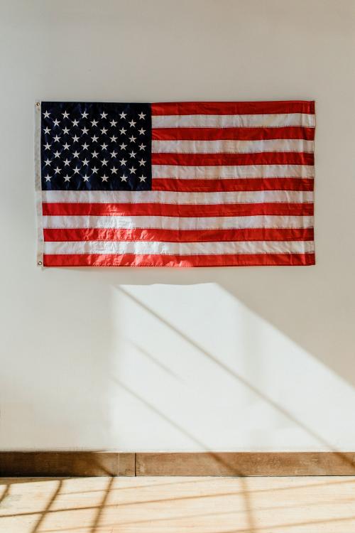 US flag on a white wall - 2027361