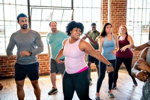 Diverse people in an active dance class - 2045851