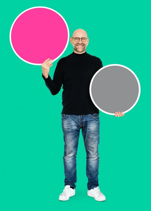 Cool entrepreneur holding blank circles - 493026