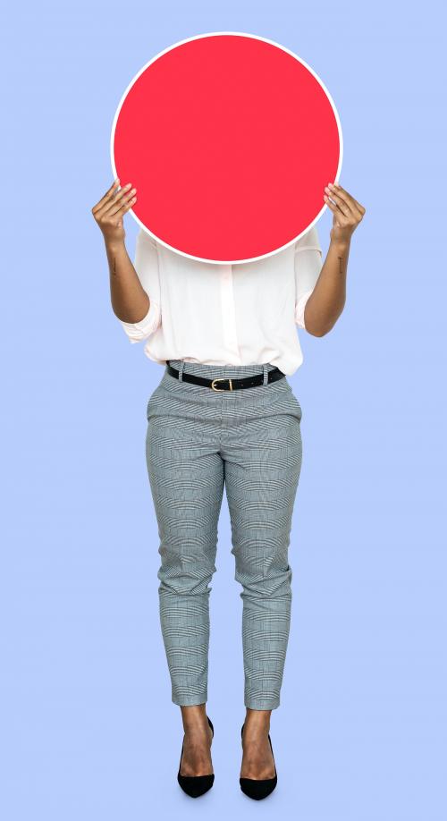 Woman covering her face by a blank board - 493073