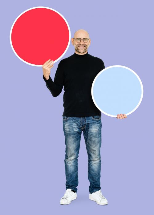 Cool entrepreneur holding blank circles - 493076