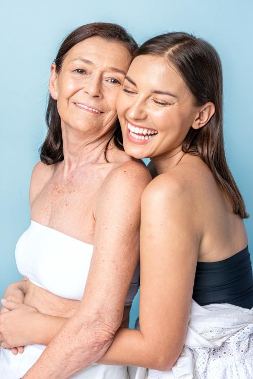 Happy mother and daughter hugging - 2230486
