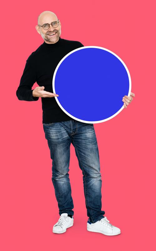 Cool entrepreneur holding a blank circles - 493091