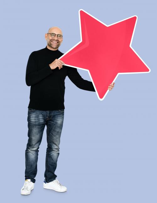 Cool man holding a star icon - 493113