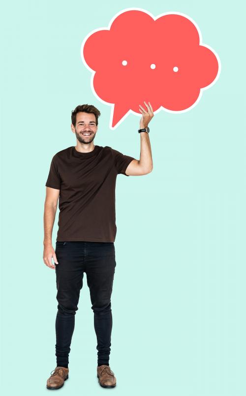 Cheerful man holding a blank speech bubble - 492214