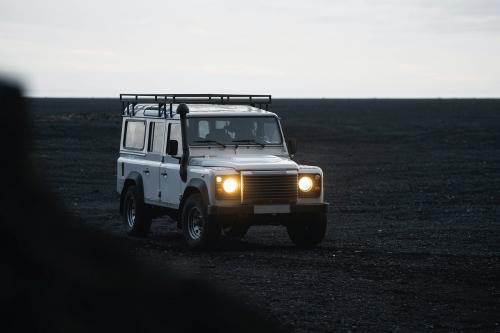 Car driving on the black sand beach, Iceland - 2042777