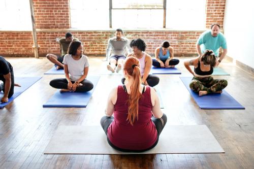 Diverse people in a yoga class - 2045863