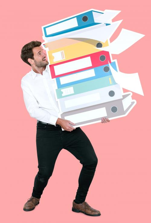 Young businessman carrying a stack of binders - 492353