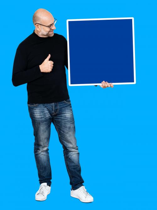 Man showing a thumbs up and a blank board - 492439