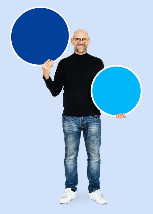 Cool entrepreneur holding blank circles - 492447