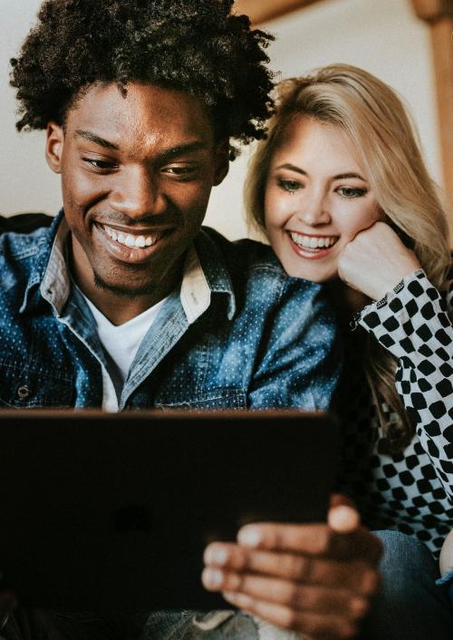 Diverse people using a digital tablet together - 2206328