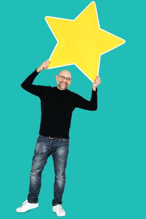 Happy man with a big star icon - 492548