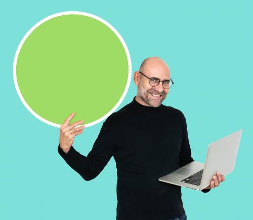 Happy man with a laptop and an empty board - 492592