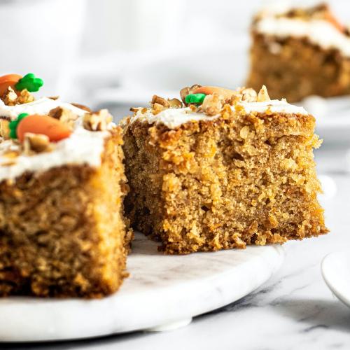 Slice of fresh homemade carrot cake - 2269714