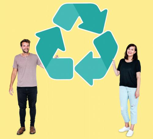 People holding a green recycling symbol - 492637