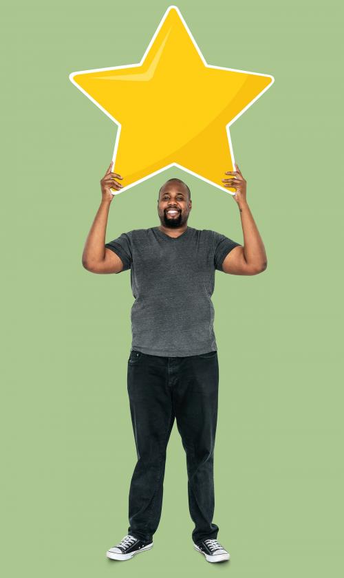 Cheerful man holding a golden star rating symbol - 492674