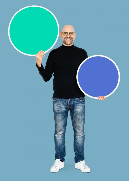 Cool entrepreneur holding blank circles - 492700