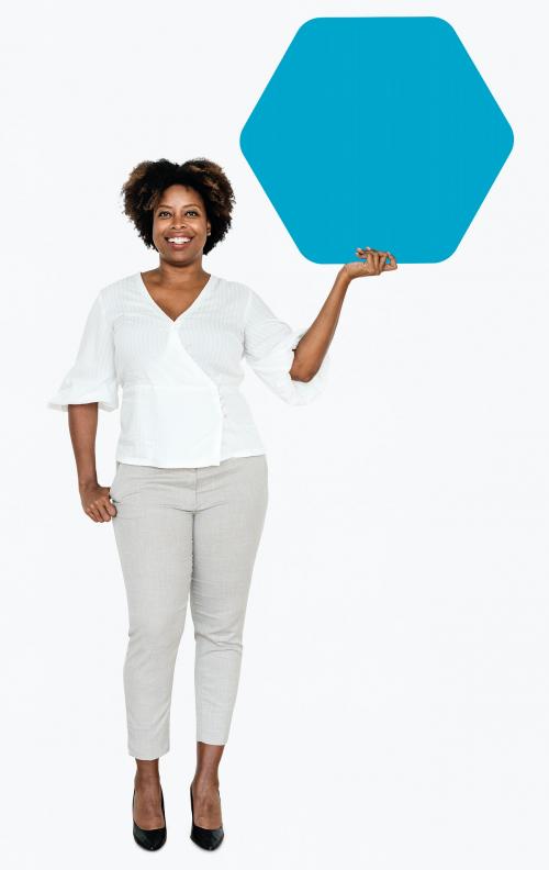 Cheerful woman showing a blank blue hexagon shaped board - 491289