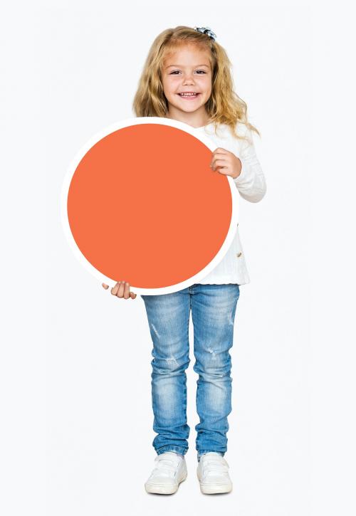 Happy girl holding a round orange board - 491559