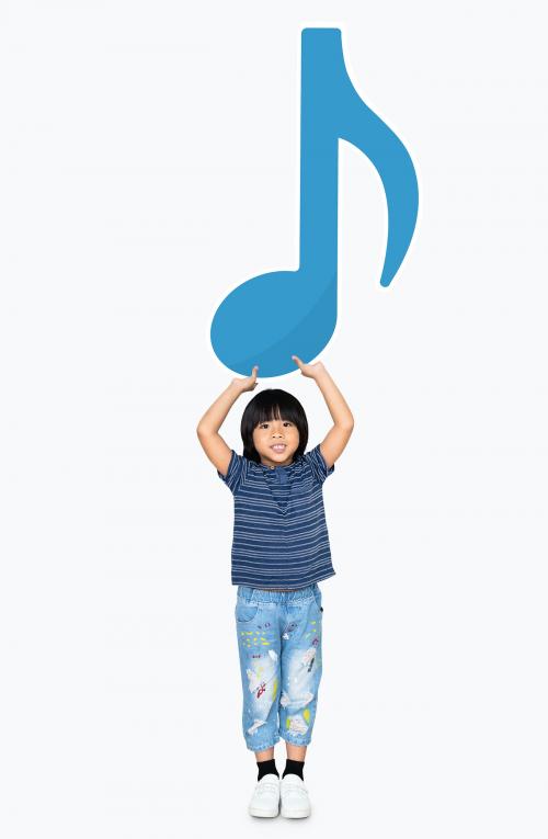 Young boy holding a music note - 491689