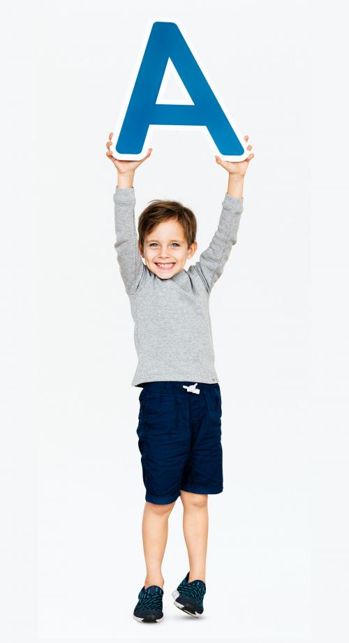 Happy boy holding the letter A - 491725