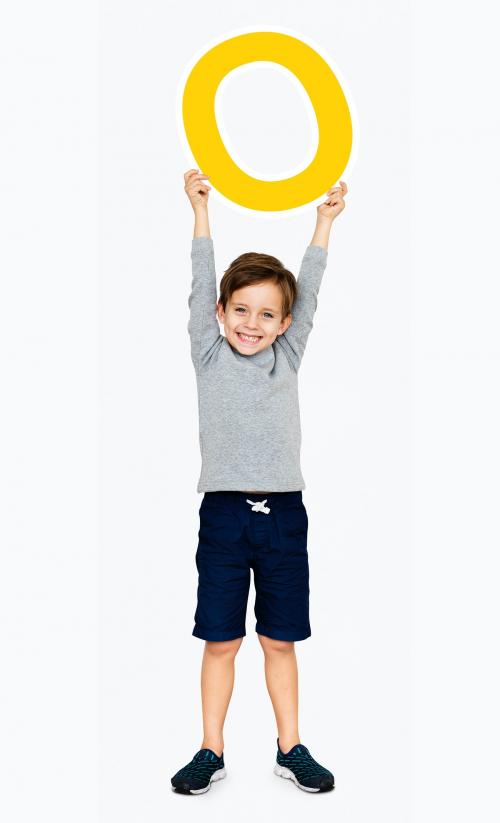 Happy boy holding letter O - 491766