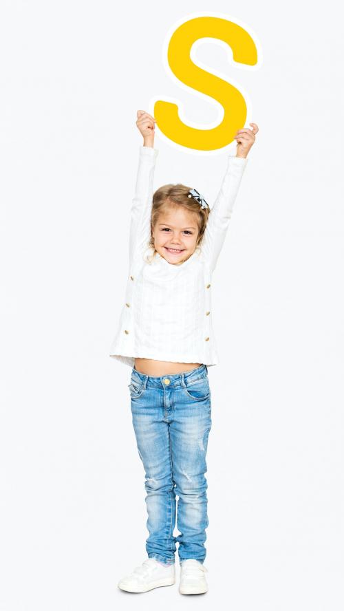 Cheerful girl holding the letter S - 491800