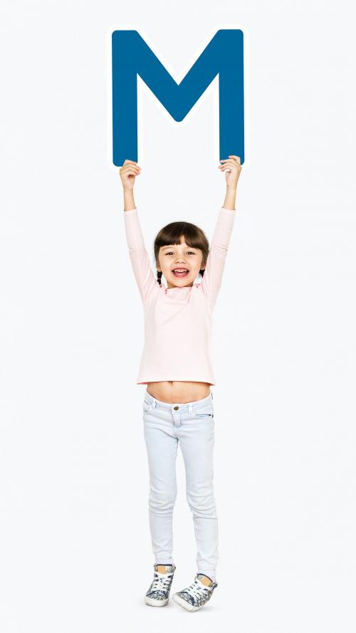 Cheerful girl holding the letter M - 491897