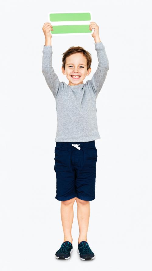 Cheerful boy holding an equal sign - 491900