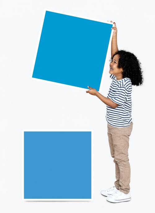 Happy kid stacking empty blue boards - 491913