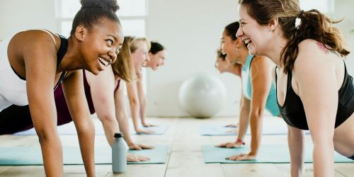 Group of cheerful women in yoga class - 2203294