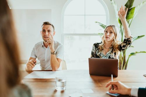 Businesspeople with laptop in a meeting - 2204798