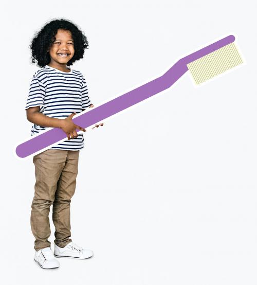 Cheerful kid holding a toothbrush - 491940