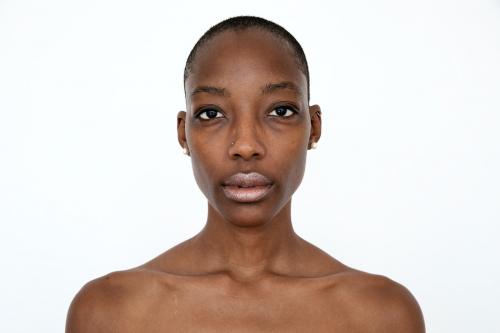 Black woman with a neutral facial expression - 2249977