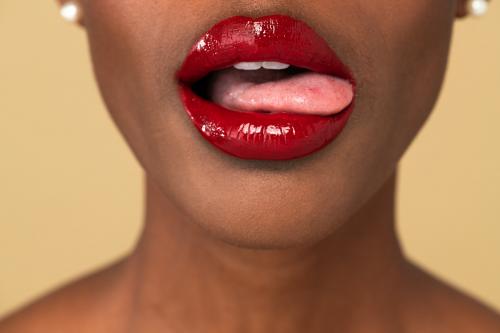 Black woman sticking her tongue out - 2254259