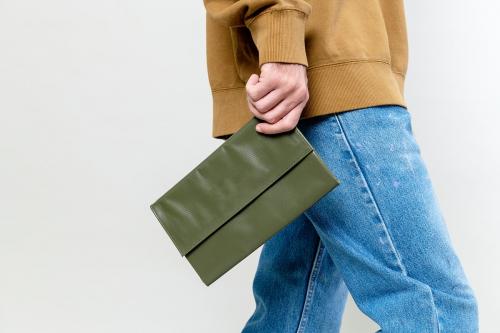 Woman with a green purse - 2287443