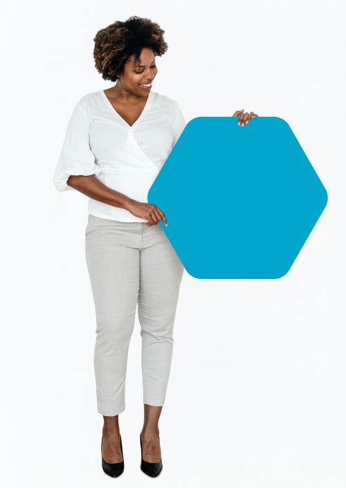 Cheerful woman showing a blank blue hexagon shaped board - 490952