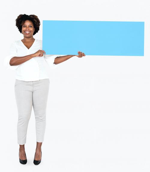 Cheerful woman showing a blank blue banner - 490966