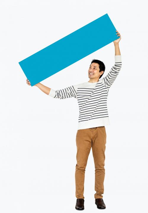 Cheerful man holding a blank blue banner - 491013