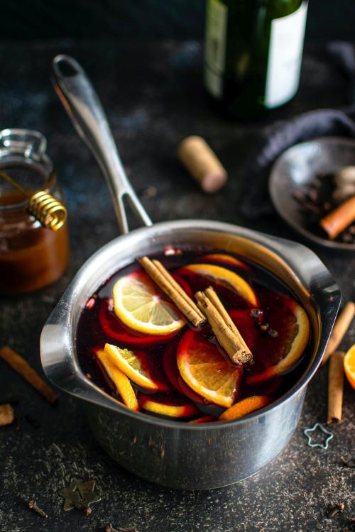 Festive holiday mulled wine in a pot - 2037892