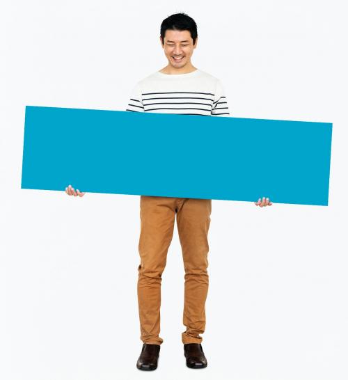 Cheerful man holding a blank blue banner - 491022