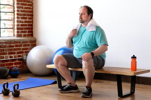 Tired man resting after workout - 2046434