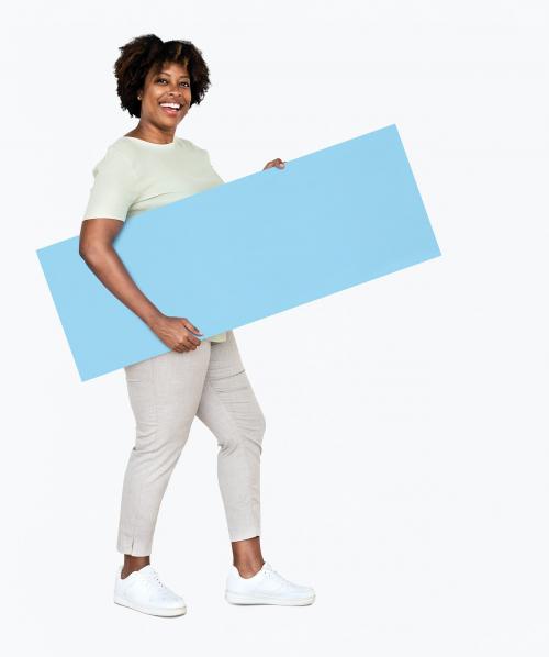 Cheerful woman showing a blank blue banner - 491056