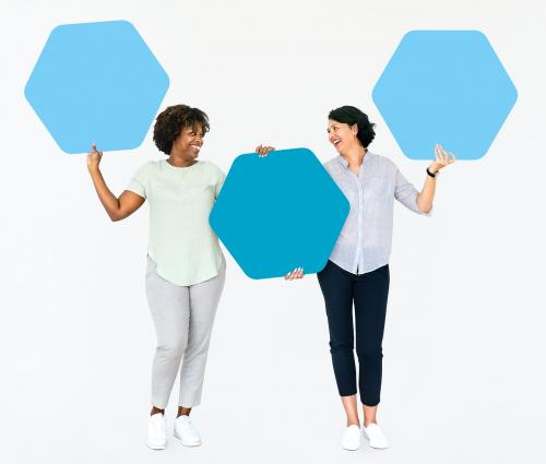 Diverse people showing blue hexagon shaped boards - 491080