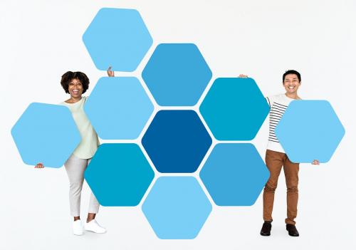 Diverse people showing blue hexagon shaped boards - 491101