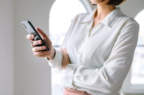 Businesswoman using a mobile phone - 2203512