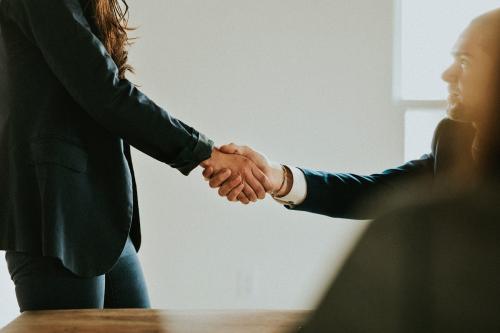 Business people shaking hands in agreement - 2204770