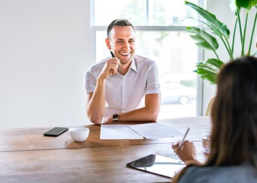 Happy businessman in a meeting - 2205048